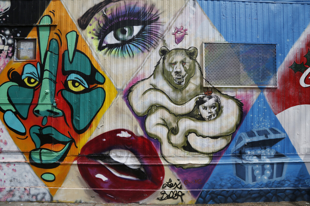 NEW YORK - APRIL 16, 2015: Mural art in Lower East Side in Manhattan. A mural is any piece of artwork painted or applied directly on a wall, ceiling or other large permanent surface
