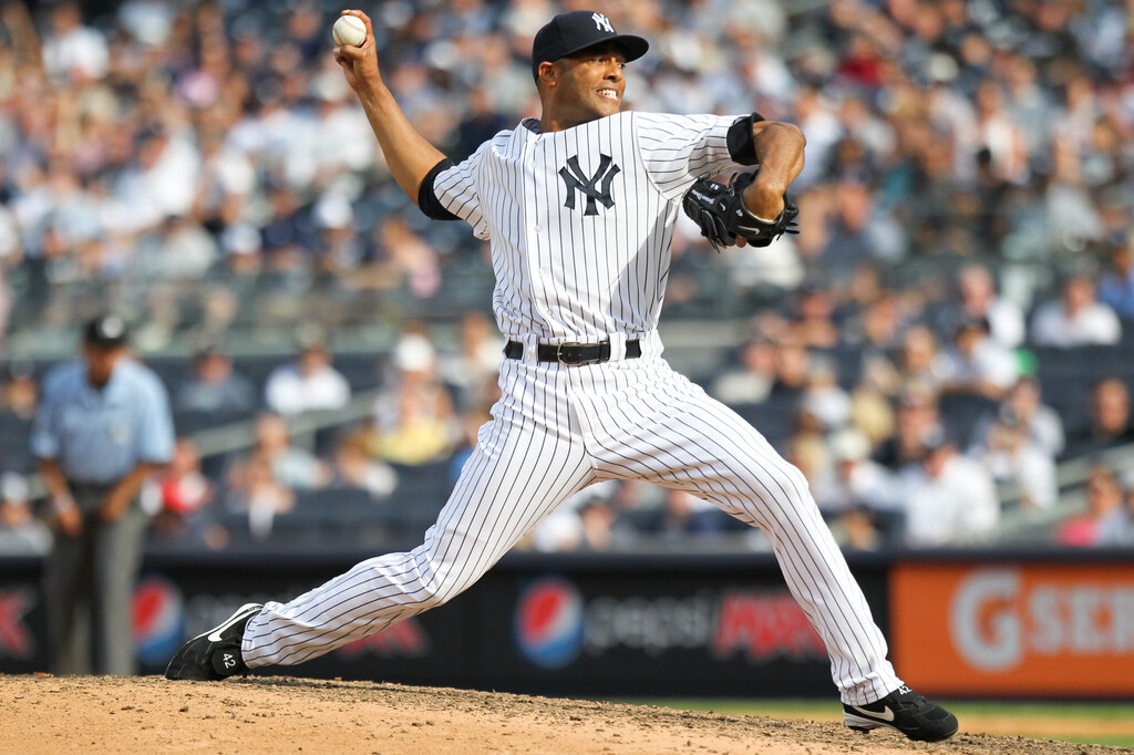 BRONX, NY - JUN 26: New York Yankees relief pitcher Mariano Rivera (42) pitches against the Colorado Rockies on June 26, 2011 at Yankee Stadium. 